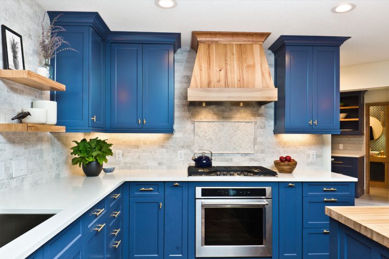 A brand new kitchen, with blue refinished cabinets