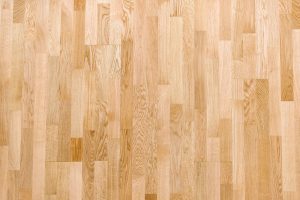 Light brown laminate flooring.